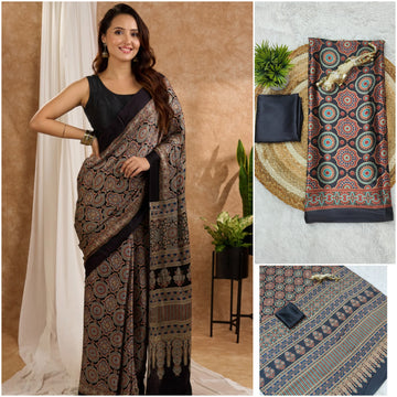 Ajrakh Print Border with Ajrakh Rich Pallu With Contrast Blouse.